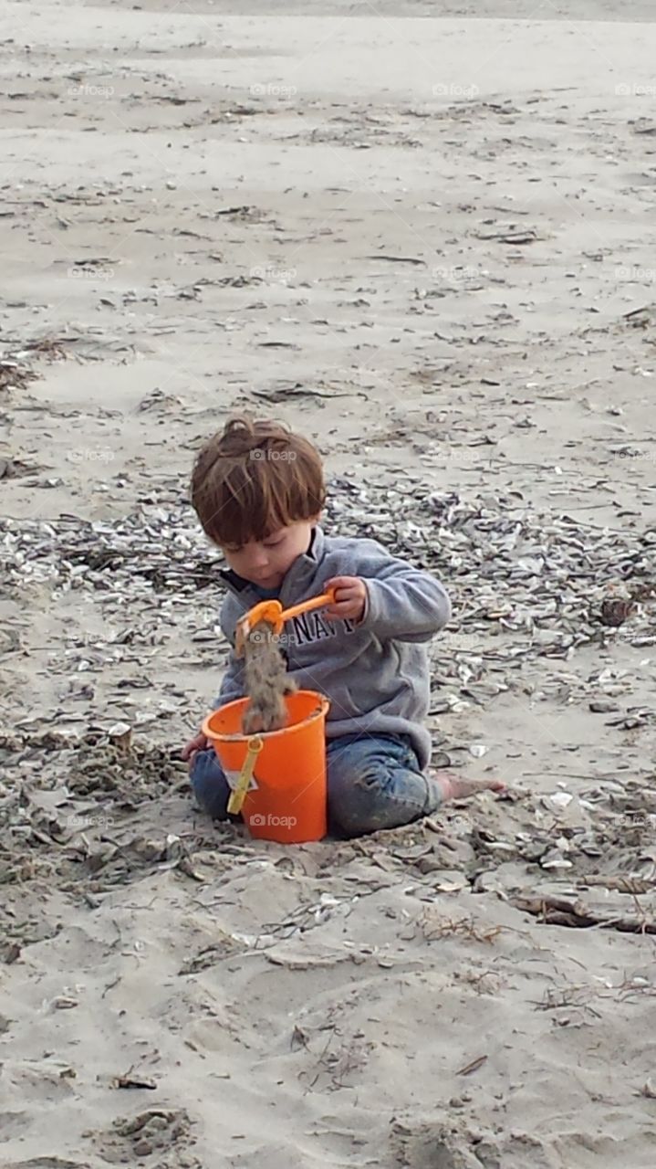 playing in the sand 