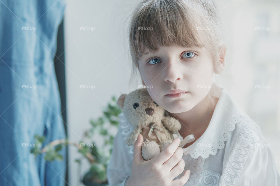 Little girl with her favorite toy