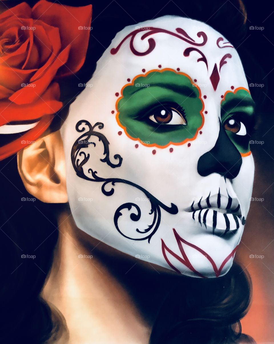 Painted face on wall