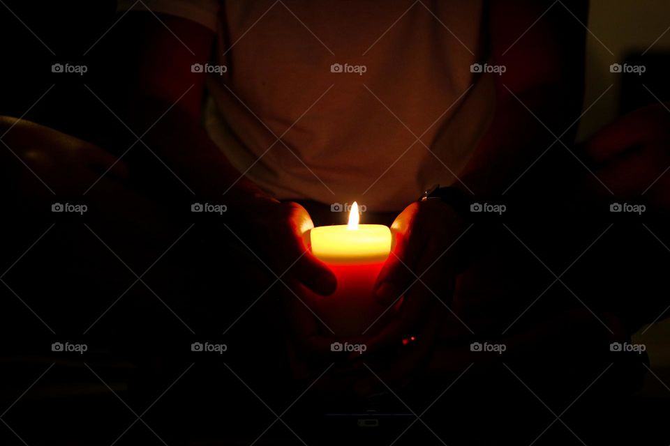 Silent Illumination: A Moment of Peace with the Candle's Glow