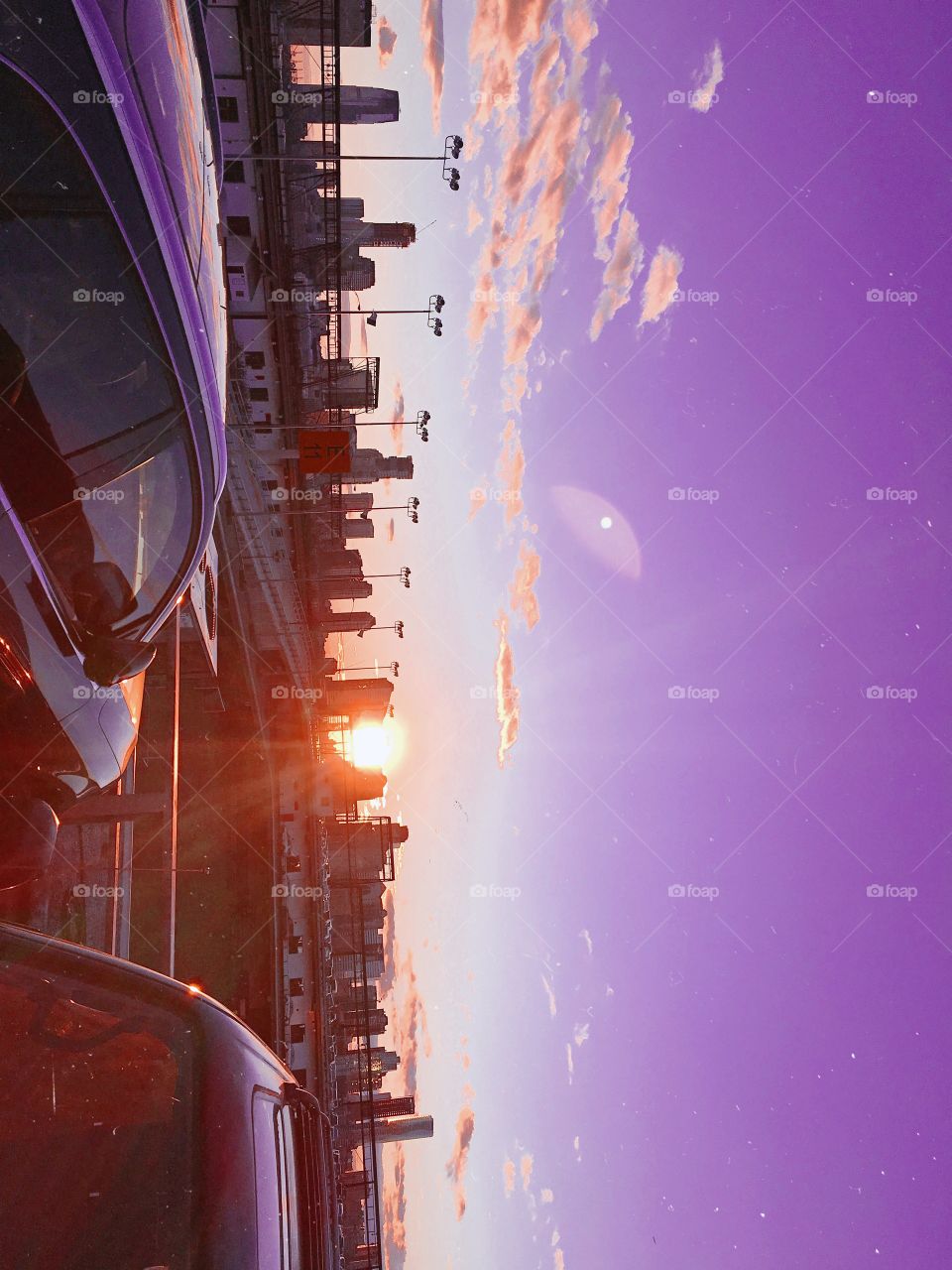 Tinted Manhattan Skyline with a Purple Haze as the Sunsets 