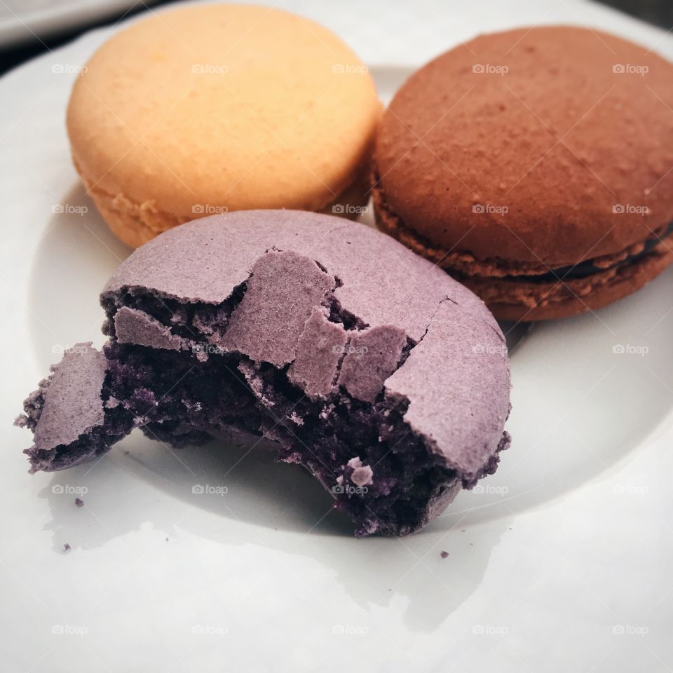 Sweet macaroons on plate