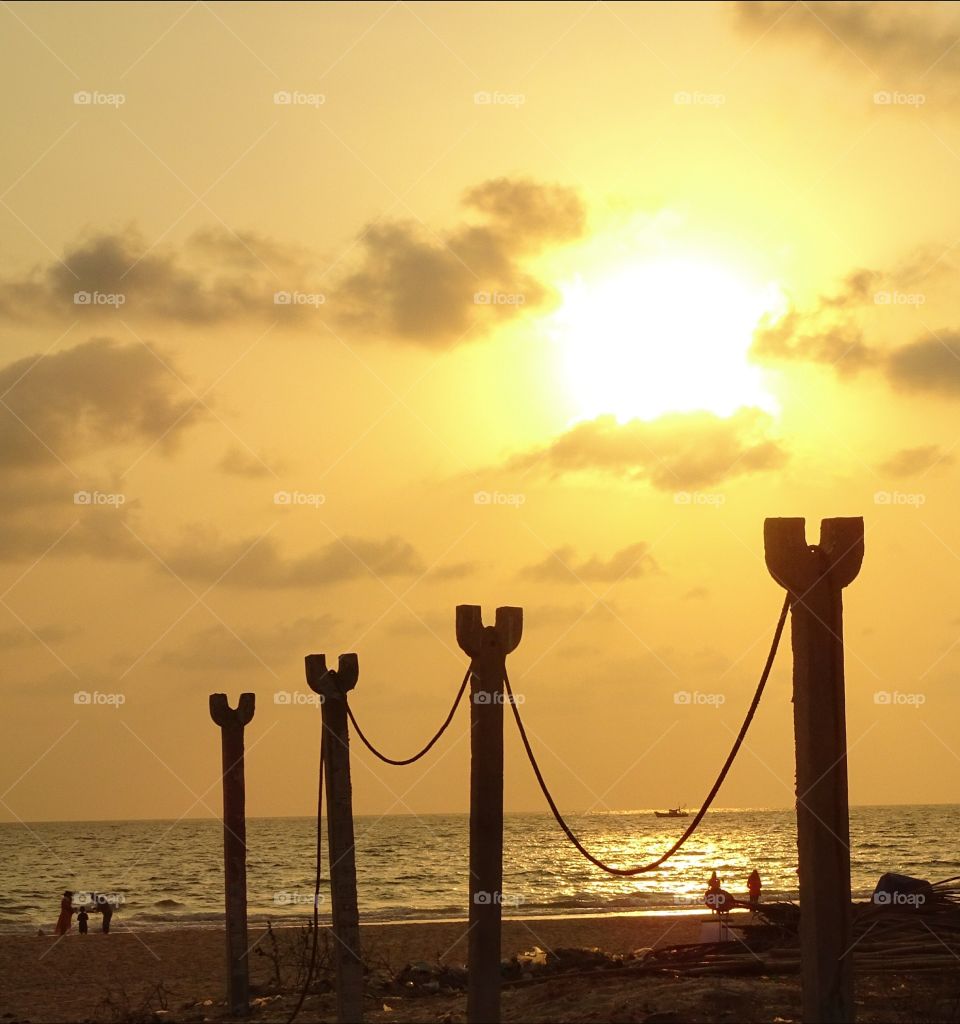 silhouette of pier in beautiful golden hours