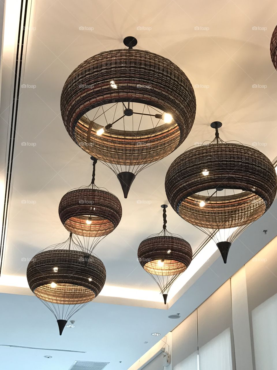 Beautiful lamps hang from ceiling