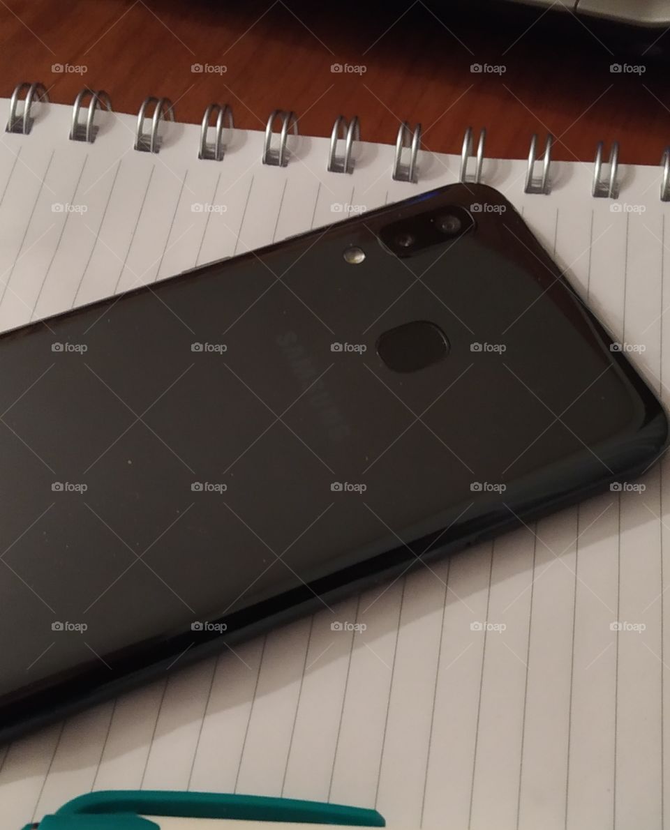 Samsung cell phone on notebook