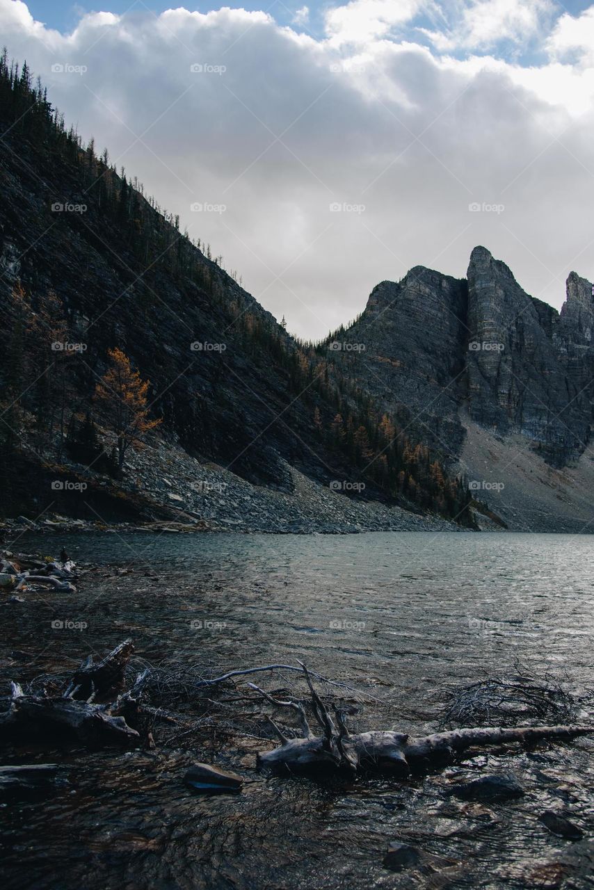 Canadian Rockies mountains in Alberta with blue water and snowy peaks