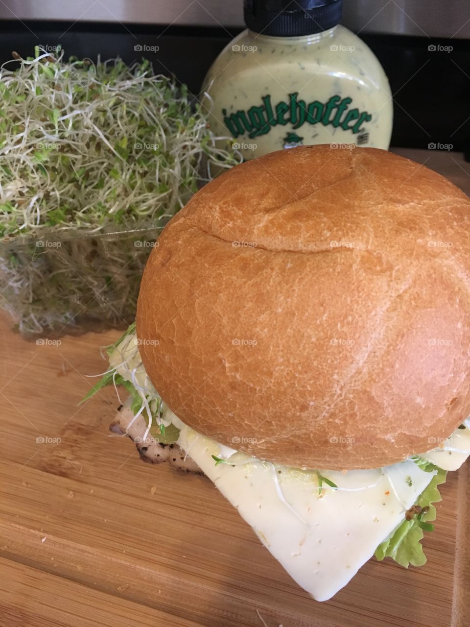 Sandwich with specialty mustard and alfalfa sprouts 