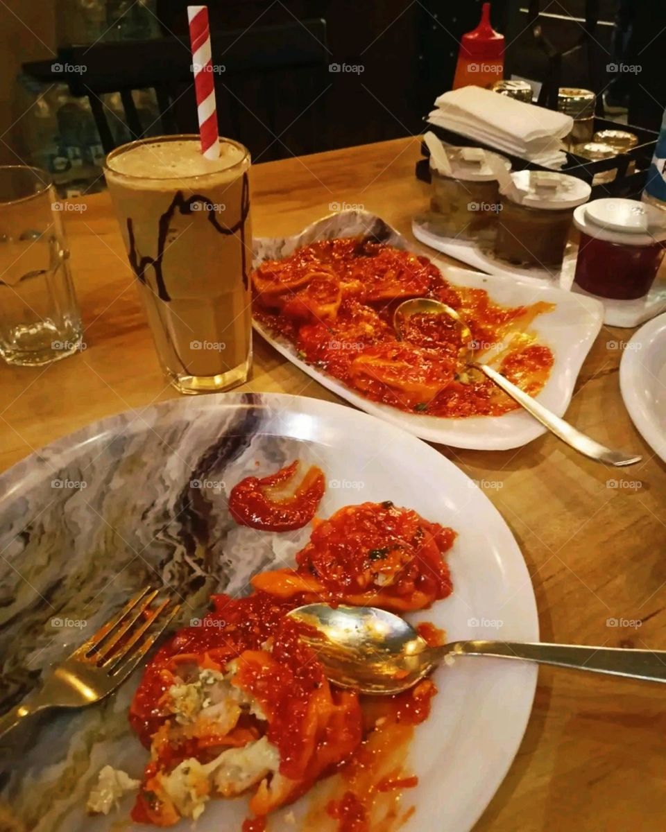 Having breakfast in a restaurant.