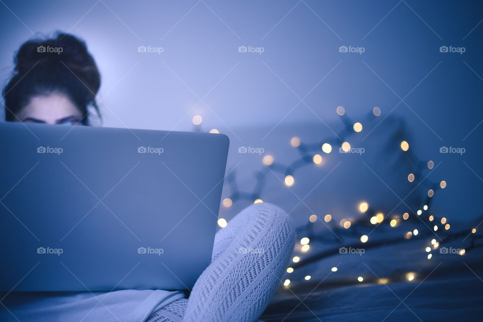A lady using a laptop 