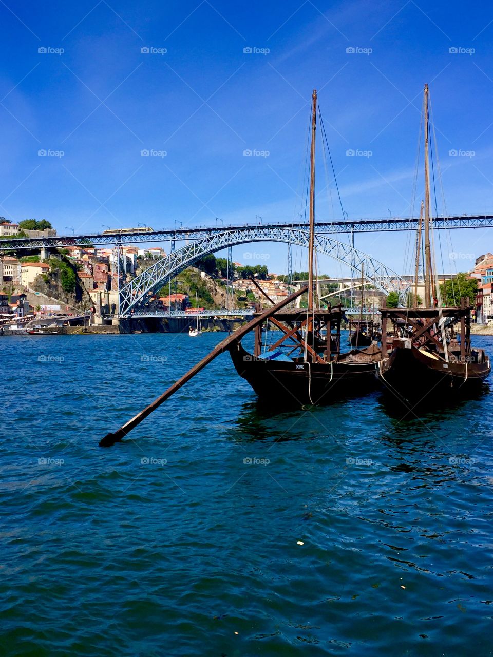 An old sailboat near the bridge