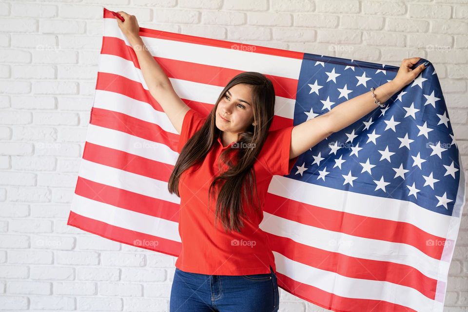 woman holding USA flag