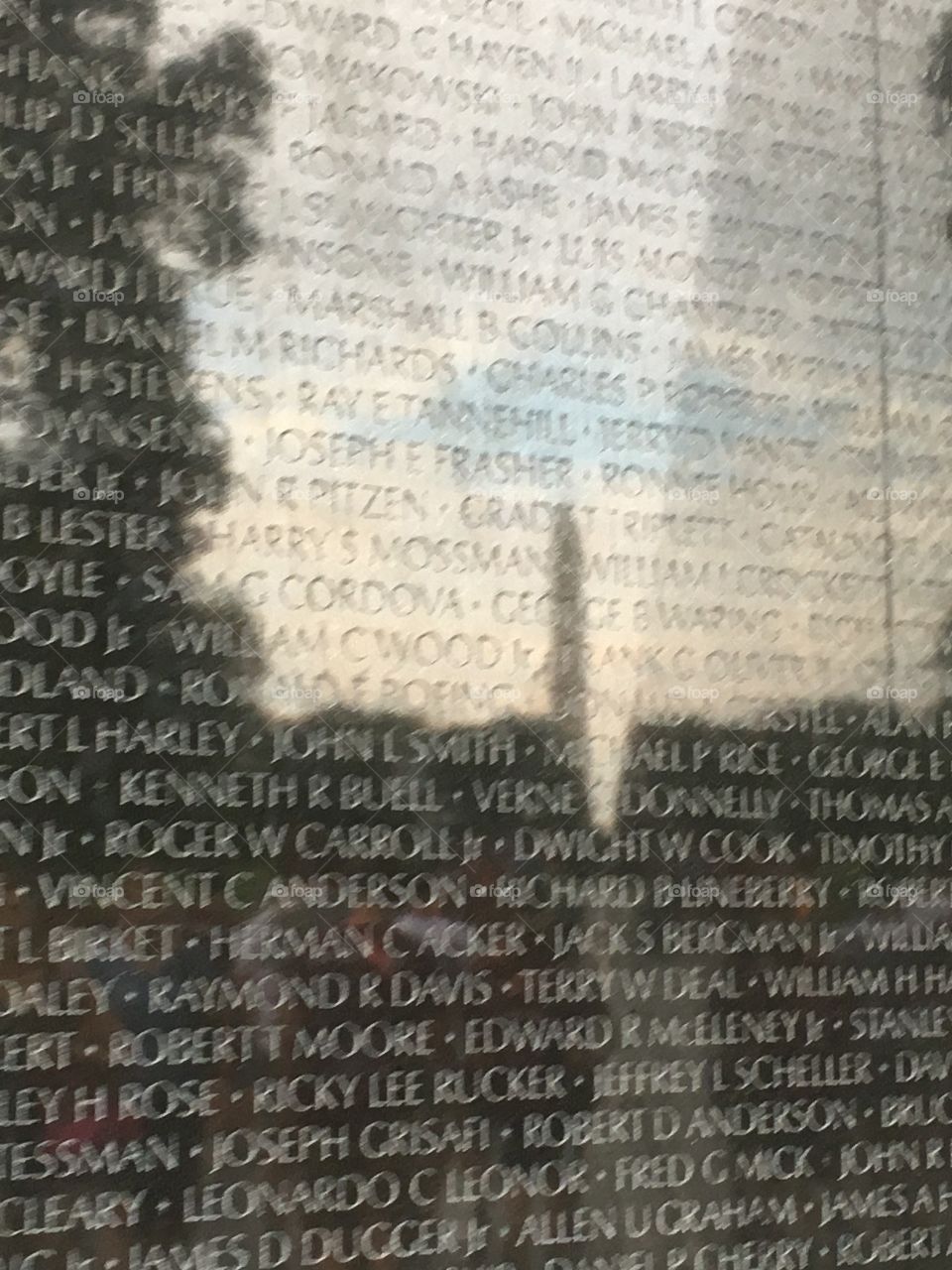 Washington Monument reflected in the Vietnam War Veterans Memorial. 