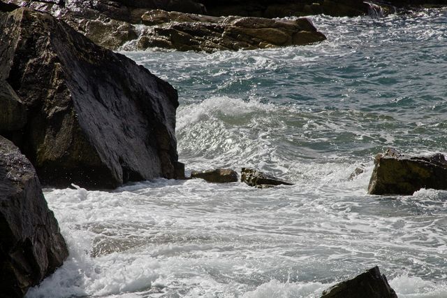 water flowing into the rocks