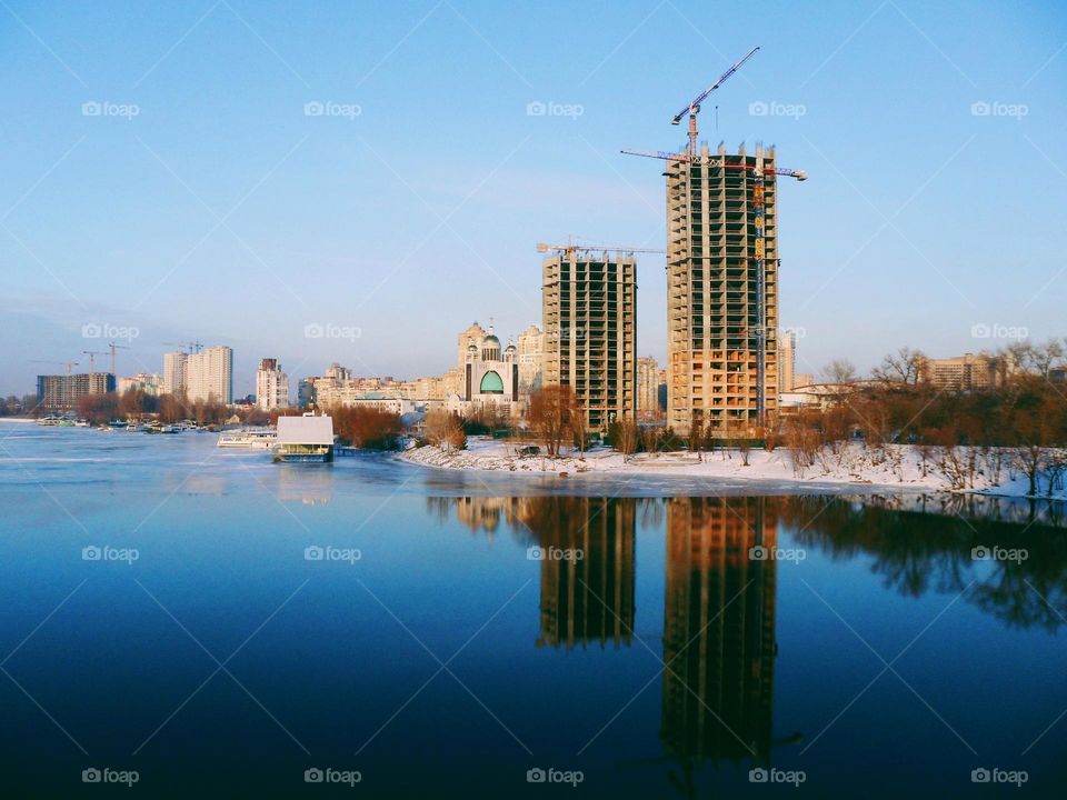 mirror reflection on the water of the houses