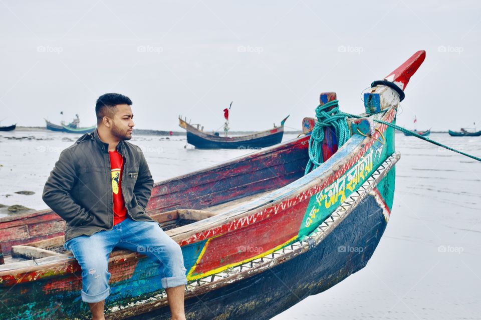 Sitting beside the seashore and enjoying the colourful meaning of life.... :) 