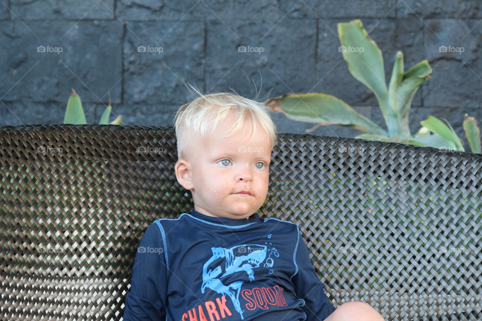 Cute blue eyes baby relaxing on vacation 
