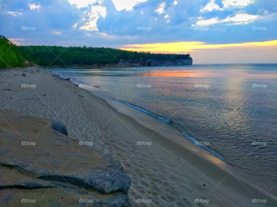 Sunset over chapel beach at pictured rock