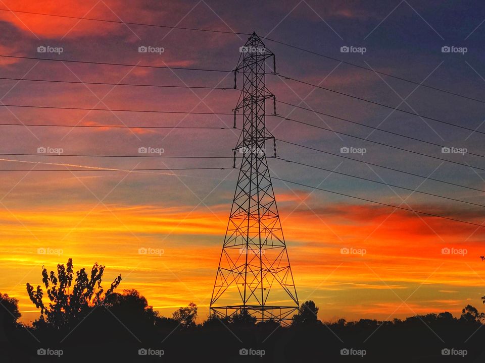 Power tower with a sunset