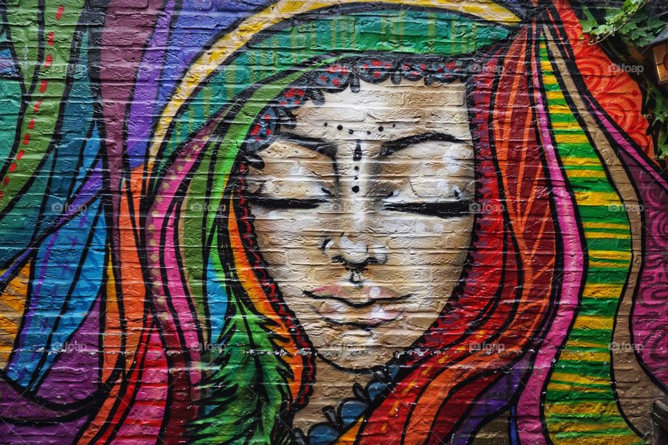 Street art … lady painted on a wall 