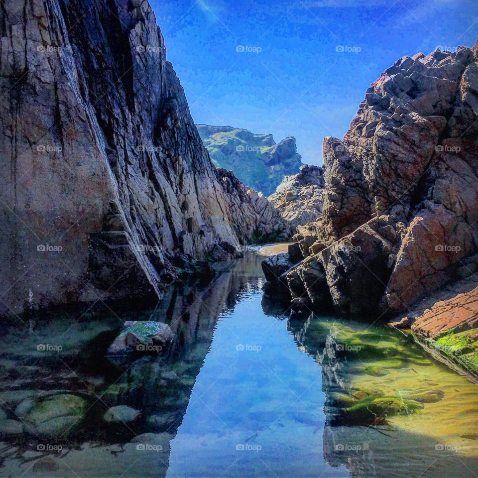 Rock pools near the mountains of plemont 