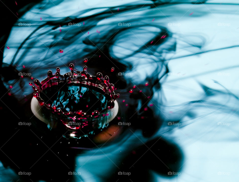 Water Drop  - Red with blue background