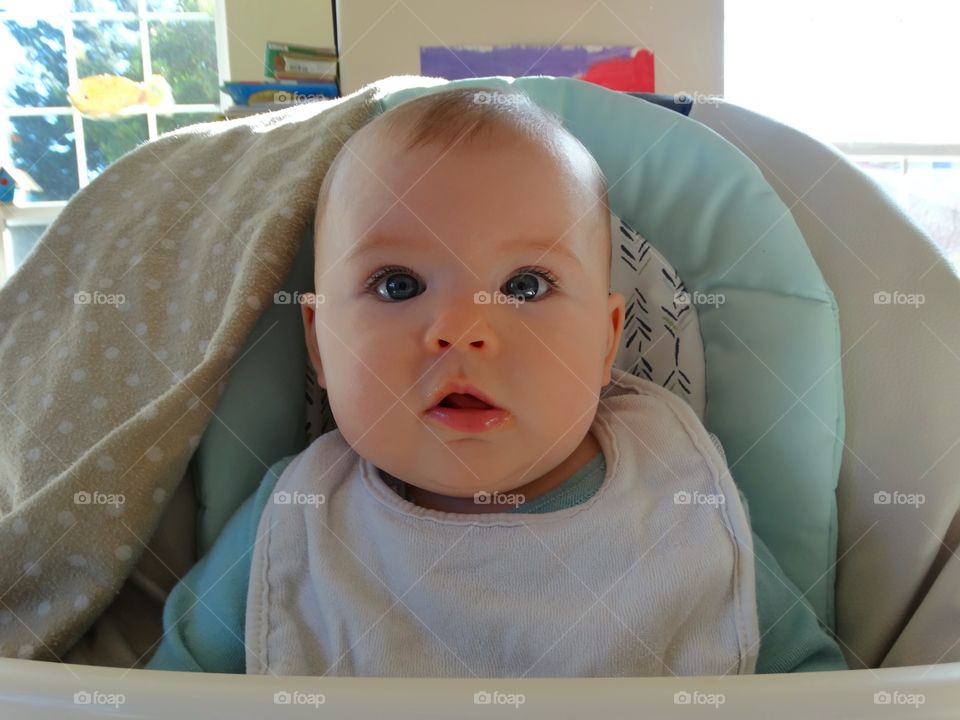 Baby In A Highchair
