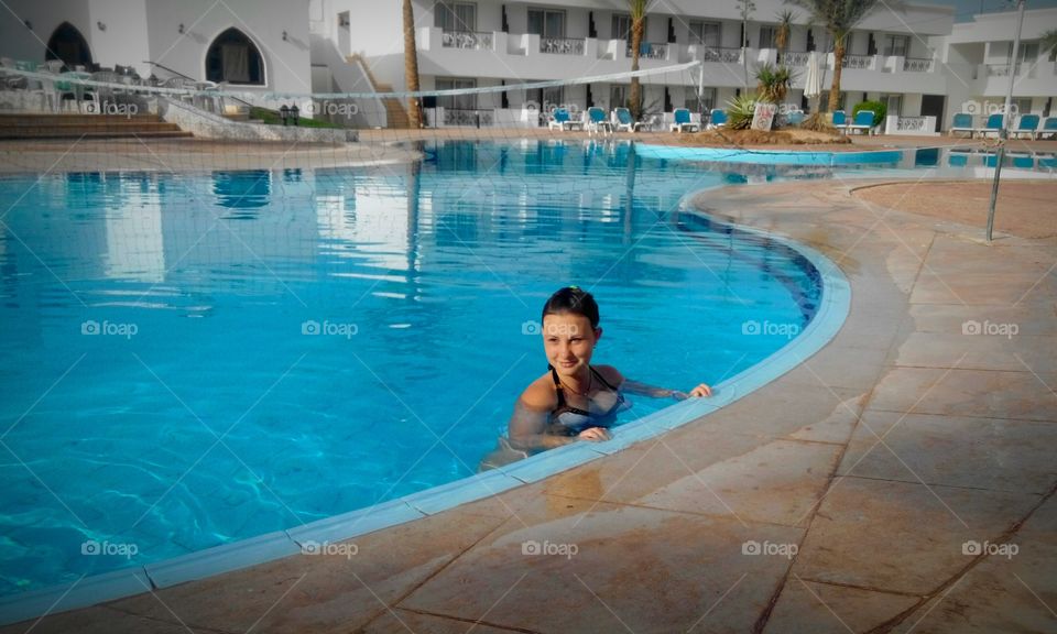 young girl in the pool