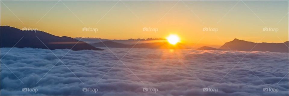 Sunrise above the clouds