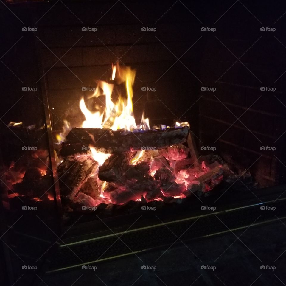 finally cold enough outside to enjoy a fire in the fireplace. this is my happy place