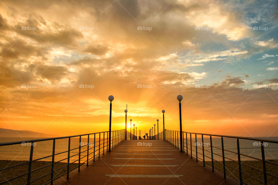 golden sunset on the seaside. the sky painted in gold in the hour of sunset on the shores of black sea