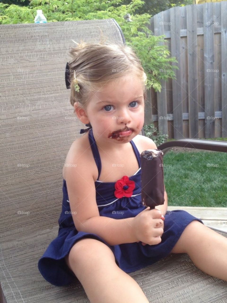 My little sister at 3 enjoying a fudge popsicle 