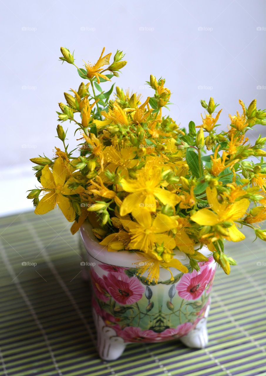 yellow flowers in vase, summer time