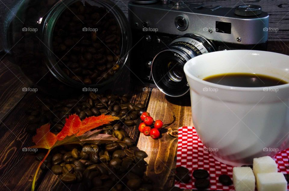 coffee been still life on wooden background