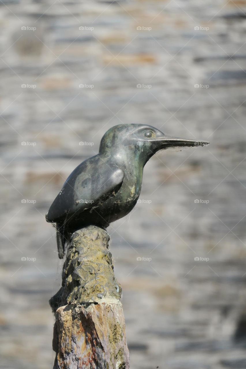 Metal bird statue at La Gacilly