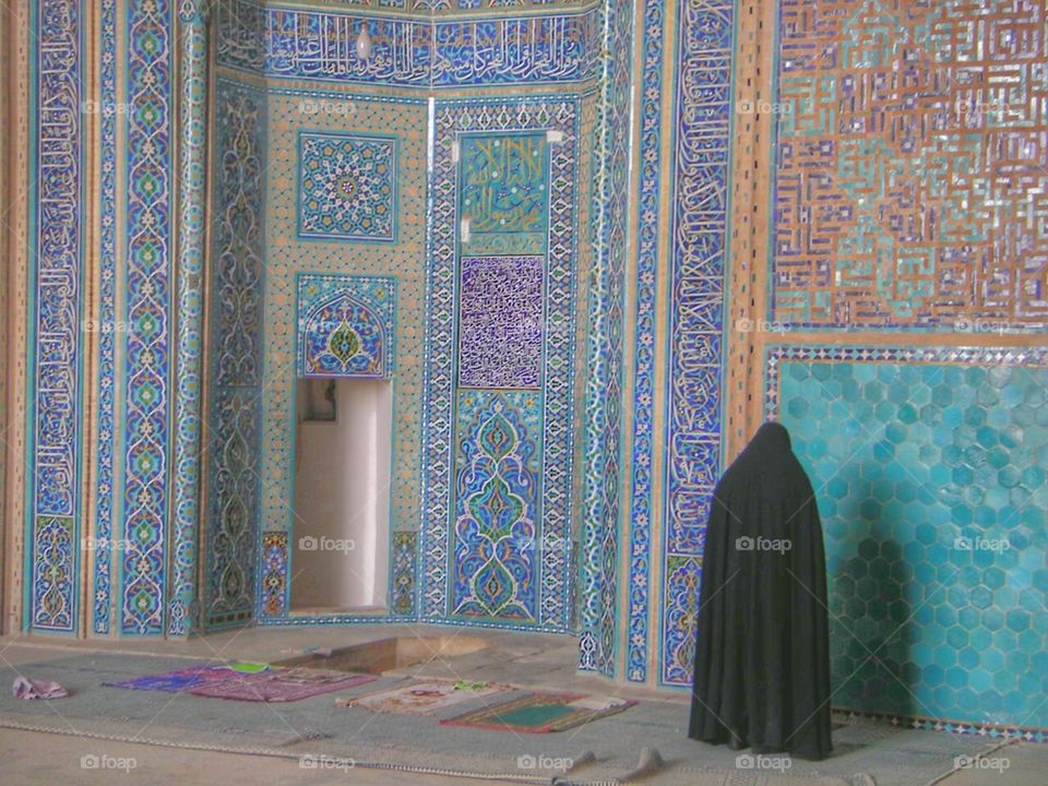 Woman in Iranian mosque 