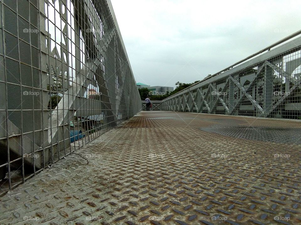 metal bridge crossing road for safety