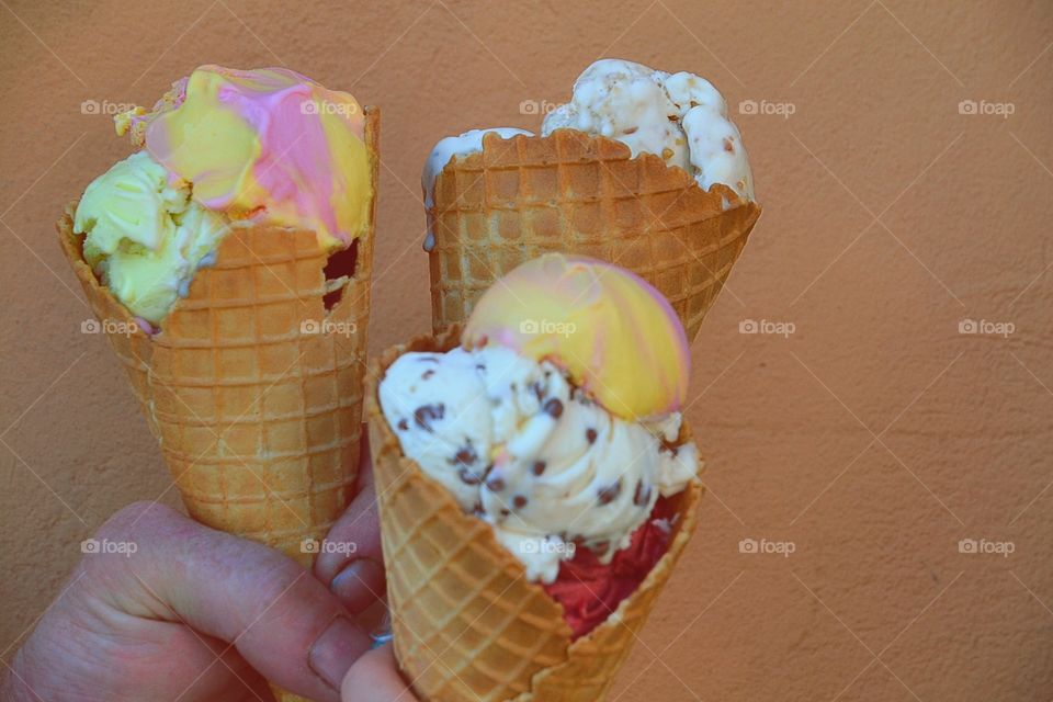 Close-up of hand holding ice cream