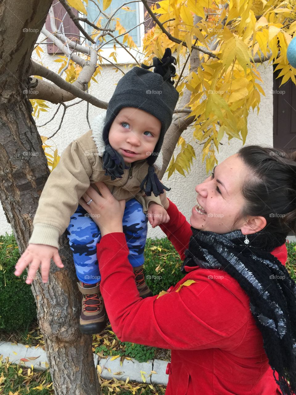 Mom and son outdoors in the fall 