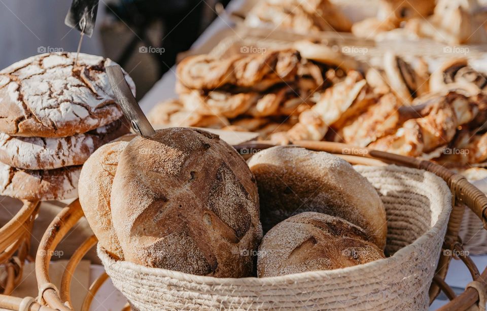 Close-up photo of freshly baked bread at market stall