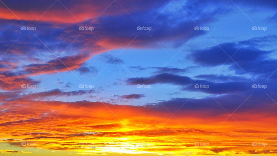 Full frame of orange clouds during sunset