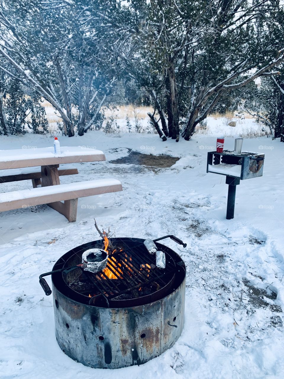 Camp fire in the snow