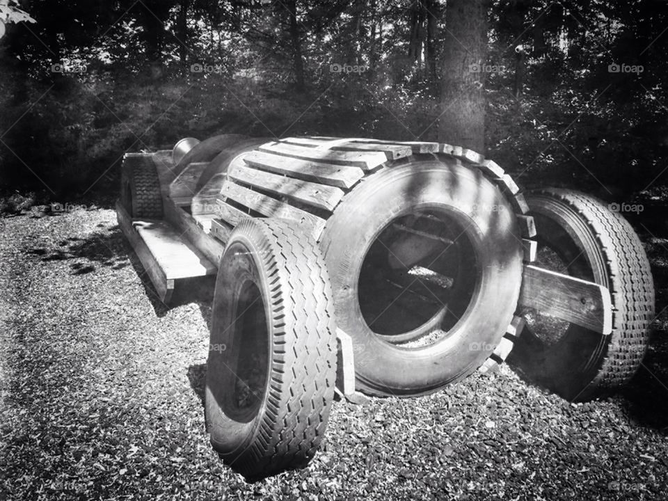 Car made from old recycled tires and wood. 