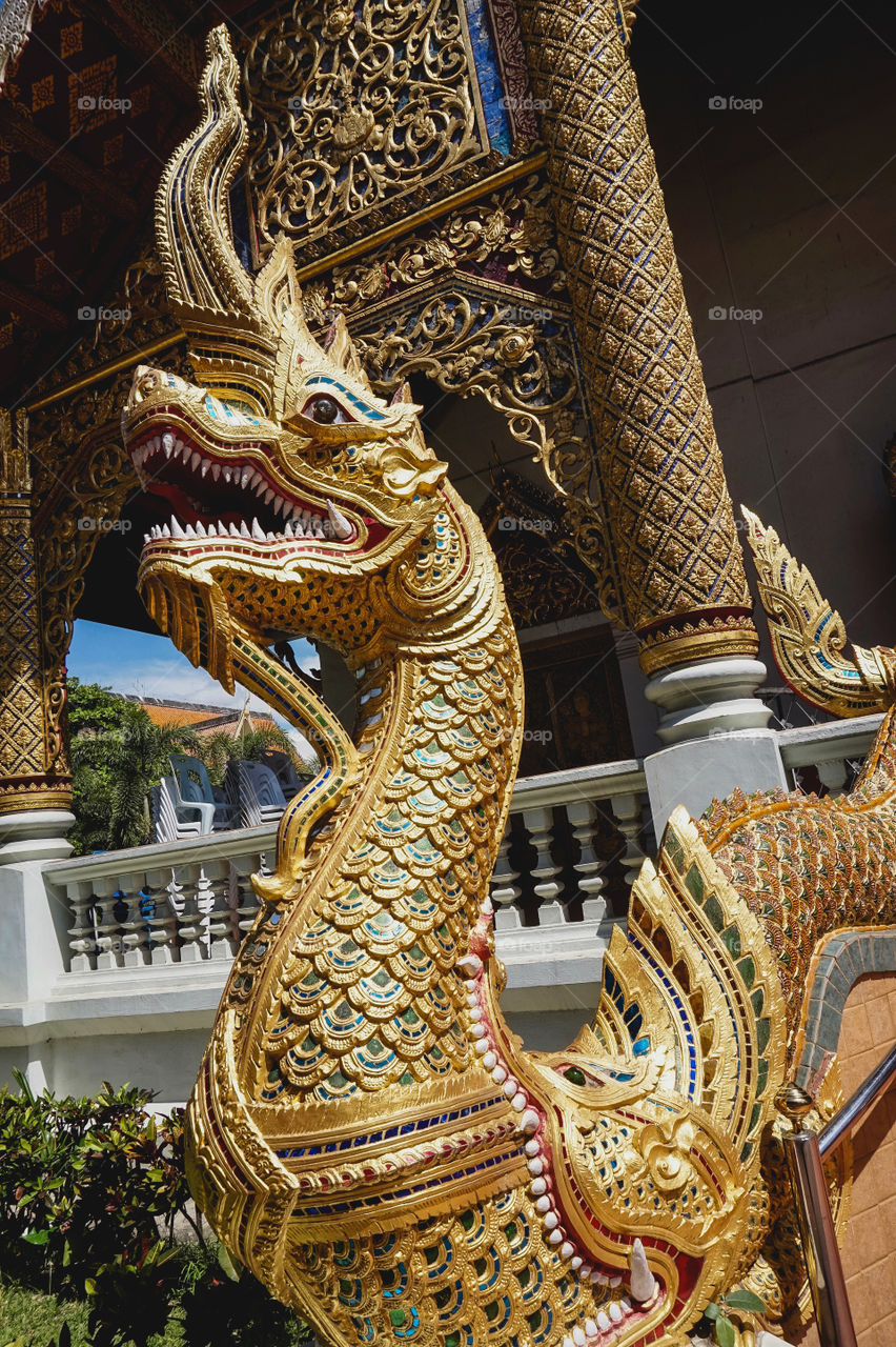 Dragon at the steps of Wat Phra Singh in Chiang Mai, Thailand 