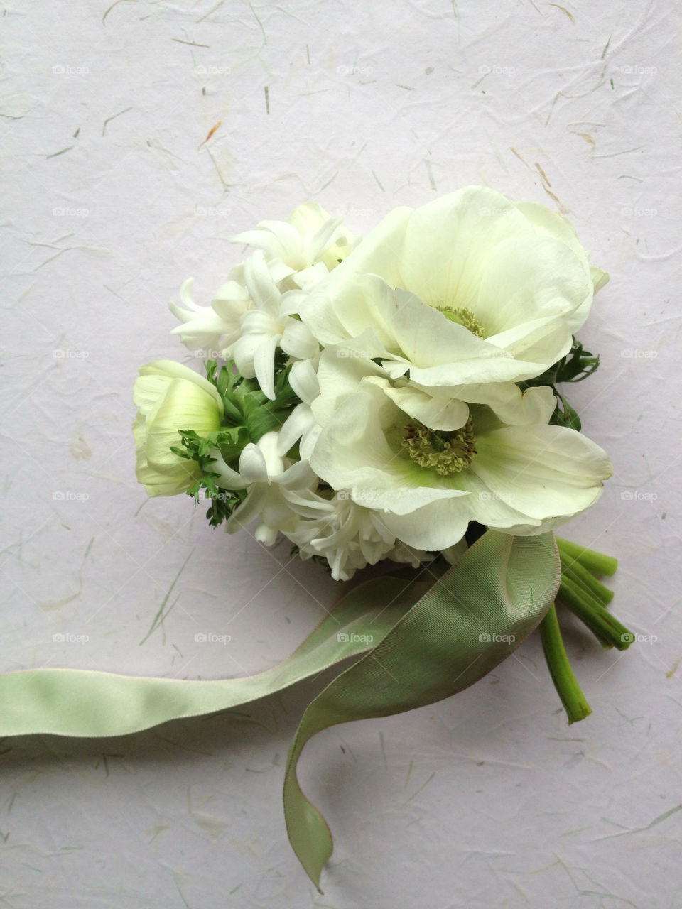 White spring flowers with ribbon