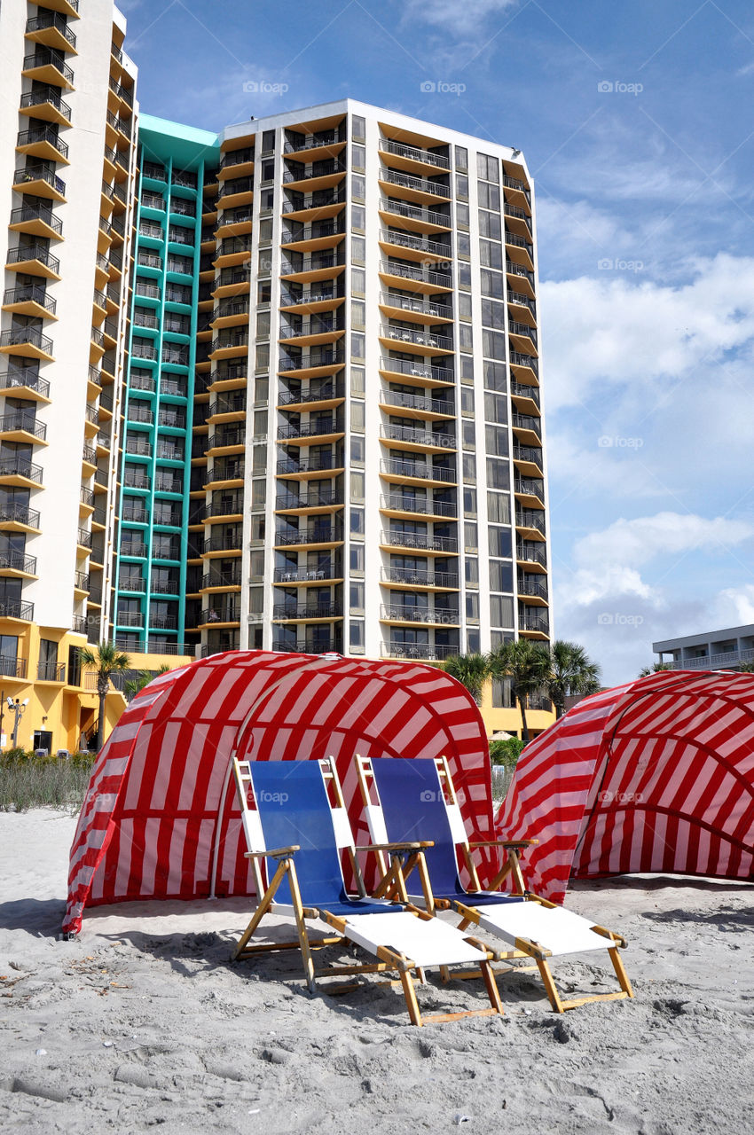 Beach chairs and cabana. 