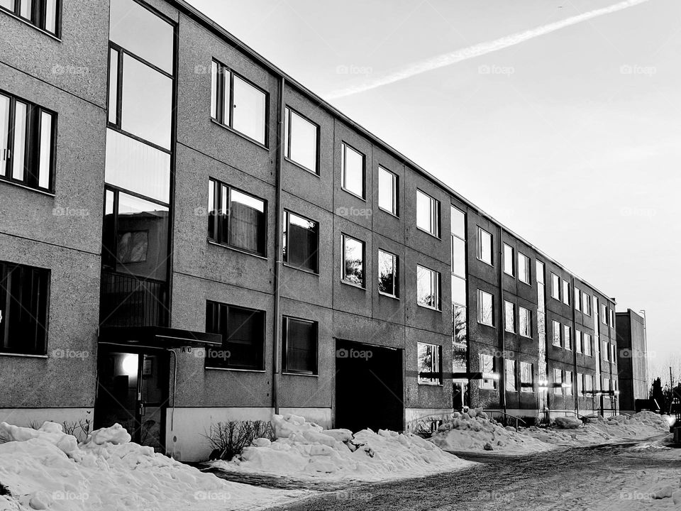 Black and white monochrome low residental apartment house building facade exterior 60’s architecture