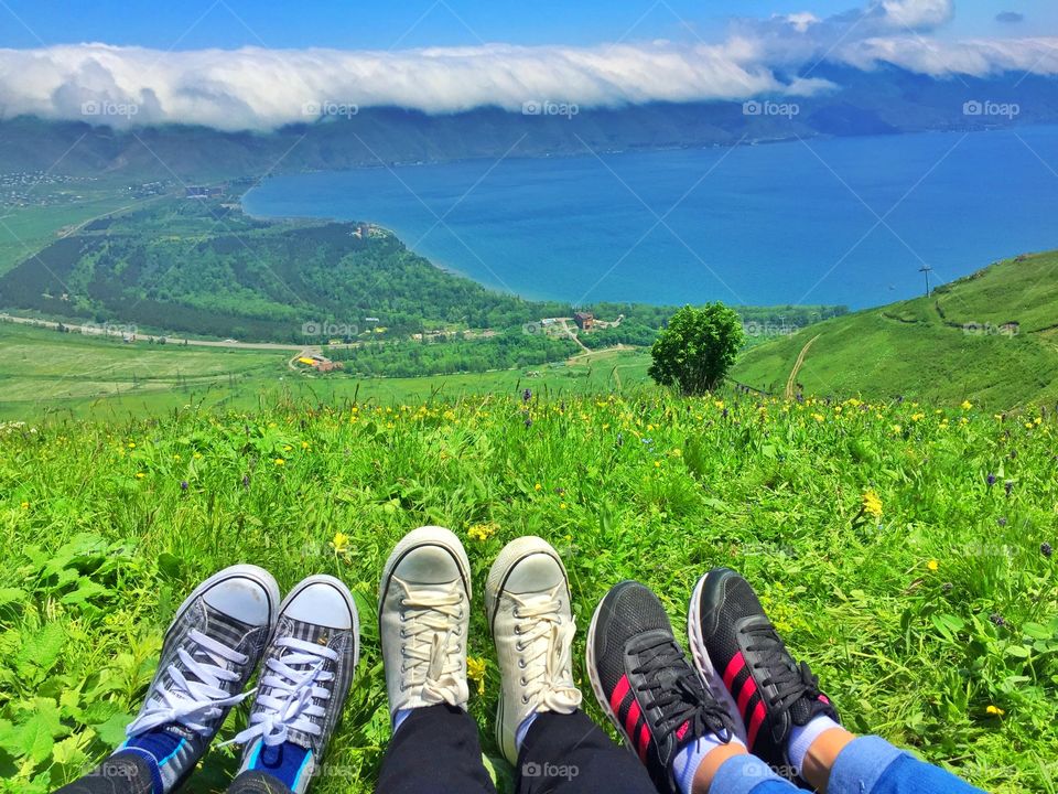 Travelers' shoes. Great view of the Sevan Lake