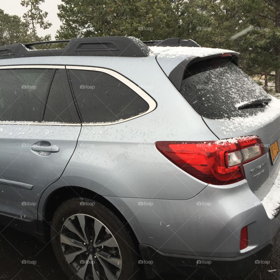 Subaru in snow at Grand Canyon 