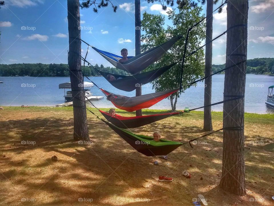 Hammocks stacked by the lake