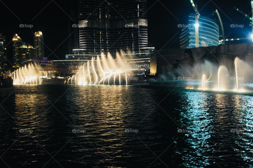 Dancing water display in Dubai mall evening time 